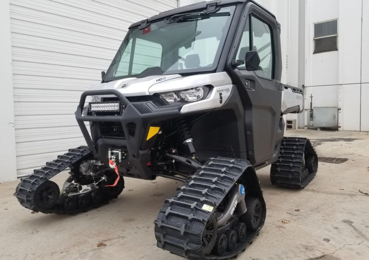Defender with Camso UTV Tracks Defender with Camso UTV Tracks