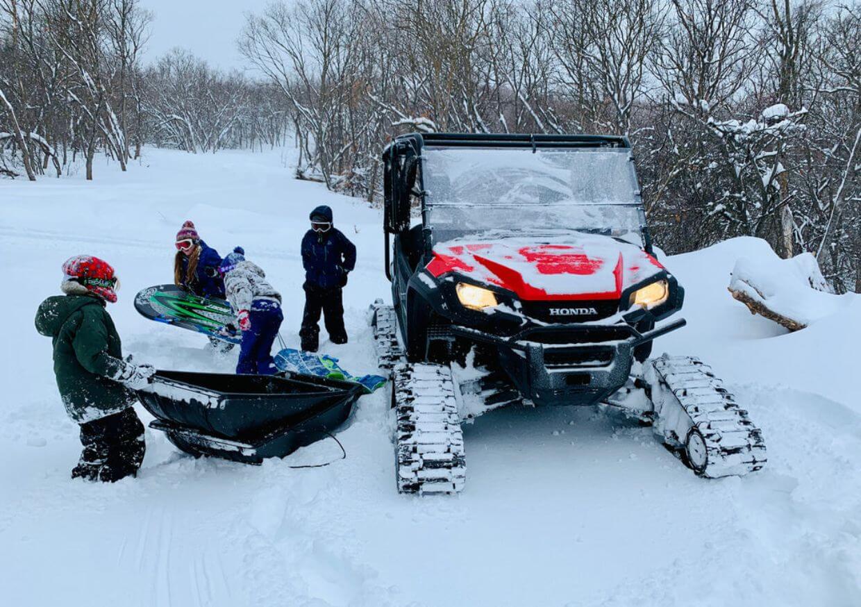 Hauling the kids up the hill for sleigh rides Hauling the kids up the hill for sleigh rides